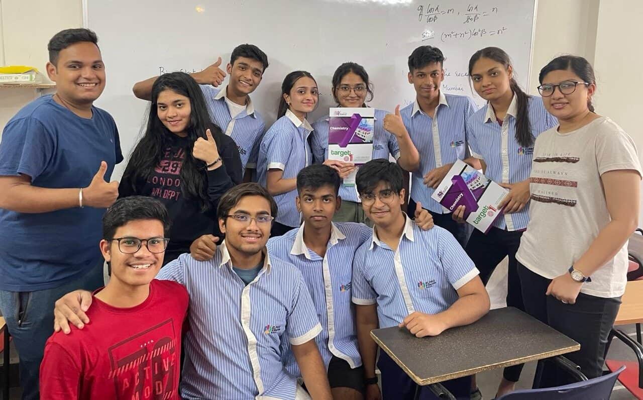 Students studying NEET notes in classroom at Target 1 Academy Wakad