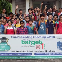 "Group of students and teachers at Pune's leading coaching center, Target 1, celebrating academic success."